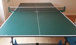 Ping Pong table in good shape with net. Must pick up.