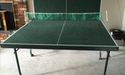 Ping Pong table. Originally bought at Costco. HAs casters to roll it, and folds up for easy storage. In great condition.