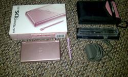 I am selling MY pink DS Lite.  Adult owned, in perfect condition.  Comes with original box and charger.  Six games included. I will also throw in a charger stand, game protectors and an extra stylus.  I am selling because I use my ipod for my games, no