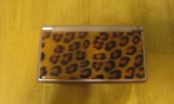Excellent Condition Nintendo DS Lite Pink in color with Leopard print protective cover. Comes complete with both wall and car chargers and carrying case.
 
Games included are:
Petz Dogs 2
Sally Salon
Big Brain Academy
New Super Mario Bros.
Are You Smarter