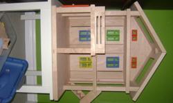 This is a great doll house that comes with everything you could think of for a doll house.  It is a Plan Toys doll house, like you can get at top end toy stores like Simply Wonderful in Guelph.  It would make a great Christmas Gift!  Everything is wood!
