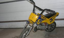 Pocket dirt bike for sale.  This is a fast little bike.  Great condition.  Yellow in color.  Lots of new parts and ready to ride.  New rear tire, carb, reeds, heavy duty metal pull cord casing, and heavy duty pull cord.   Asking $165.00 o.b.o.