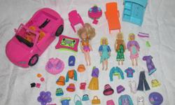 Hello, we are selling a small lot of four Polly Pocket dolls, some clothes and accessories, some furniture, and a car. The car was originally a converible with another piece on it, but that has broken off. Still can be played with as a car.
The dolls and