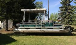Harris Flote Bote, 8ft. x 16ft. deck. 20ft. pontoons, canopy, 5 swivel seats plus 2 bench. 25hp Johnson electric start motor in good condition. Canvas custom built cover. New tires (2015) and spare. Located in Yorkton. Asking 7,000.00 Ph. (306)547-7618
