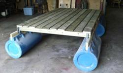 Homemade Raft for Sale:
Great for kids to fish or swim off.
2X6 Treated lumber on deck with angle iron support.
Floats are made of high impact Polyethylene exterior filled with high density urathene foam.
Comes with oar locks, 2 oars, 2 swivel seats.