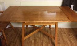 Table extends on both sides (see images)
Solid wood
Glossy finish - would be a nice staining project
Comes with 4 chairs (not pictured) - same wood & colour - 3 the same (without arms) one with arms
Length is 42 inches not extended
62 inches with both