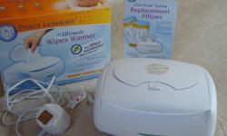 The ultimate wipes warmer dispenser, keeps wipes moist without browning and anti-microbial. Also included is 2 replacement pillows still new in box. Large tub holds all standard refill packs. Power indicator and night-light.
Like new condition, from