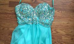 Perfect condition prom dress. Only worn once. Willing to lower price. Altered. Baby blue, with a sequinned top.