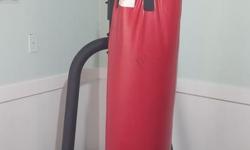 Free standing punching bag stand, bag, and speed bag attachment as shown in the photo.
Not sure of the punching bag weight but it must be at least 100 lbs. It's in good shape but it has settled a bit. The speed bag attachment show in the other photo goes