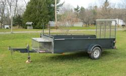 I'm selling my 5x12 Utility trailer. It is made of steel NO WOOD! Wheel bearings just repacked, new springs, tires are good Rear ramp load Comes with Eazy lift cable system to lower and raise the ramp (not shown in picture but is included ). Has steel