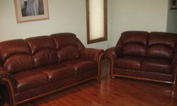 The highest qualitly Butter soft Italian Leather couch and love seat paid $3800 Like new asking $1200 or best