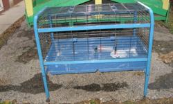 I have various rabbit cages. Different sizes and styles. Can be bought as a group. CHRISTMAS SPECIALS --THE BLUE ONE ON WHEELS-ASSORTED PLASTIC BOTTOM ONES---ALL COMES WITH FOOD BOWLS AND WATER DISPENSERS. ONE MUST TAKE ALL EVERYTHING-$100.00 FOR