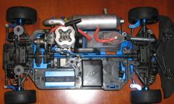 Team Associated NTC3 1/10 nitro 4wd car with .12 nitro motor and aluminum hop ups. Just add radio and receiver. Only $90.00
comes with servos.