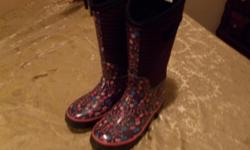 Selling a pair of Size 1 rain boots. Boots are in good condition, asking $10.