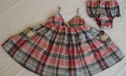 Ralph Lauren Madras Dress (Size 18 Months)
 
This preppy madras plaid dress is a pretty look for your little darling.
Rendered in an airy woven cotton with spaghetti straps and a pretty ruffled bodice.
Features include a crossover neckline with spaghetti