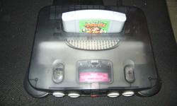 ***N64 SMOKE BLACK CONSOLE!***
Up for sale is a very rare n64 smoke black console, these consoles only came at the very end of the n64's lifespan and are extremely hard to come by!
This game system is in excellent cosmetic condition, with only very minor