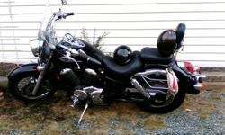 2004 Honda Shadow.. 750cc.. Black.. New Tires, Chain, and Tune Up.. Leather Saddlebag System.. Well Kept.. Winter Stored Indoors... No Rust... Great Starter Bike....