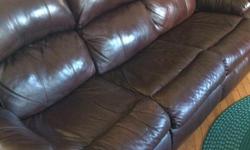 Reclining Leather Sofa and Love Seat, non smoking house, no rips or tears, located in Grenfell