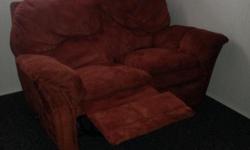Dual reclining loveseat. Microfibre rust colour. Must sell $25.