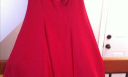 Beautiful in red dress. Simple but stunning. Size 4. Worn only a few times.