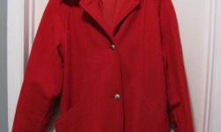 This warm wool jacket with felt lining may be a size 9/10 or 11/12.
The length is approximately 31 inches long.
The photos are not picking up the rich colour of the jacket, nor the details. It has dropped shoulders. There is piping along the coat and top