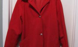 Warm wool jacket with felt lining. It may be a size 9/10. The length is approximately 31 inches long.
The photos are not picking up the rich colour of the jacket, nor the details. It has dropped shoulders. There is piping along the coat and top stitching