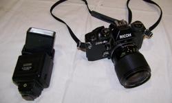 RICOH XR-2s SLR Camera, Vivitar 35-70 Zoom Lens, Sunpak Auto 30DX Flash, Hoya 52mm SKYLIGHT (1B) Filter, Remote Shutter Cable, Plus Many Extras Complete With Large Camera Bag. $150 obo. Call Wes 250-729-8886 or 250-802-3500