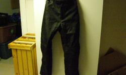 Tourmaster Quest size M overpants made of Carbolex, stronger than nylon. Waterproof, windproof but breathable, flexible removeable armor, use for motorcycle or in winter for snowmobile. Seldom used, like new.