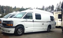 Wide body fully loaded Roadtrek van with huge outside storage for those who pack a lot. Bamboo interior, pearl white paint, under hood generator, solar, power awning, TV entertainment system, chrome rims and power twin/king bed if you are looking for a