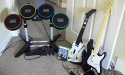 Rock Band set including:
-Game
-2 guitars
-Microphone
-Drum set
All in great condition.
Would like to sell everything together if possible - $75 or best offer.