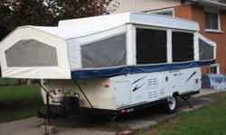 A very clean, smoke free, pet free camper for sale. 
 12 Foot plus 2 Foot storage bin on front.
 Power Winch, heated mattresses, 1 King and 1 Queen, Couch and table fold down to make more sleeping quarters.  15 gal water stoarage, water heater, sink,3