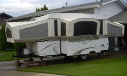 Asking $8000.00 ***OBO*** This tent trailer is like new.  It features one slide out, 2 propane tanks, AM/FM Radio/CD player with interior and exterior speakers.  Fresh water holding tank, gas water heater, outdoor shower, RV-Que, Furnace, Electric Lift,