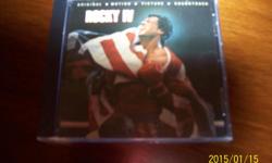 ROCKY 4 MUSIC CD NEVER BEEN OPENED FROM SMOKE AND PET FREE HOME 10.00 CALL 613-842-4832