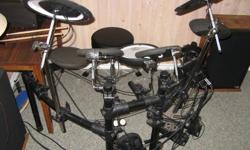 Roland TD-4K2 electronic drums.  Comes with Yamaha kick pedal, 3 years old.  Excellent condition.