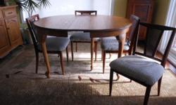 Solid oak table is 44" round with 3 10" leaves(oak).
Completely refinished.
4 refinished maple cane backed chairs recently recovered with high end neutral fabric.
All in excellent condition.
Cash and Carry.