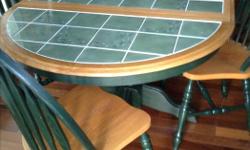 round Oak table, 2 leave 4 Chairs
Excellent condition, tile inlay.
bought new for $ 1300.00