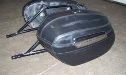 Hardcover leather looking saddlebags and mounting hardware bracket to fit a 2006 Yamaha Stratoliner 1900.Good shape asking $250 or best offer for set.