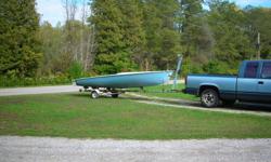 1976?  18 ft SAILBOAT and trailer,needs some TLC   Boat and trailer have Chrysler stickers on them.  Trailer could be used for other boat.
Has 20 ft approx.. mast rudder and handle etc.  $600 or would trade for JEEP project    519-426-0332   Vittoria