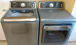 Samsung high efficiency top load washer 5.4 cubic feet and Samsung steam dryer with 11 cycles 7.3 cubic feet. Both appliances in excellent and clean condition with almost a 1 year warrantee still left. Grey/Silver in colour with some stainless steel.