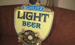Cool Vintage light-up beer sign. works great!
       call 519-800-7421