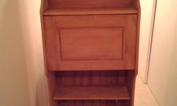 Very nice vintage Secretary Bookcase 5'high 26.5"wide and 11"deep. In great overall condition has been stripped and is ready for stain or paint. Asking $145obo. Local delivery available for a small fee. Check out our other ads for more furniture etc...