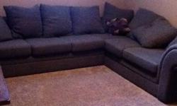 Fabric Sectional Couch, 5 years old.  Good contion, showing a little wear, not used very often, just sits in empty in rec. room for the last few years.  Perfect for a family or Rec. room.  Asking $450.00