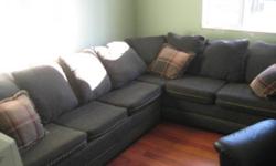 Sectional L-shape couch with pull-out sofa bed for sale, dark green in colour, great shape! No rips, tears, or stains. Is about 5-6 years old, but not used. Mattress is in excellent condition as it was only used about twice and still has plastic on it.