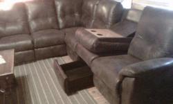 REDUCED   Elran Sectional Sofa, Dark Brown, 3 recliners, storage drawer, fold down cup holder. Purchased end of October. Worth $3000.00  selling for $2200.00 obo. 88"x113"