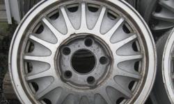 Set of four factory original alloy wheels, from a Buick Regal, 15 inch, includes the center caps, All are in good usable condition, cosmetically, a couple are actually quite nice, one of the rims & a couple of the caps have some cosmetic corrosion, but