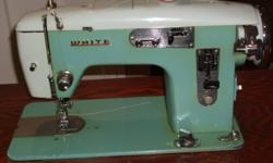 Model is a White sewing machine. Bought at Sears 44 years ago, excellent condition. It's been serviced. Home made cabinet and all accessories are there for sewing machine. Machine works well and needs nothing. Have all the paper work for it as well. Only