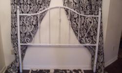 Selling an elegant white queen headboard. Made of forged iron with beautiful detail. Its in great condition. The headboard has a distress shabby chic style. Will definitely give a beautiful look to any bedroom. Measures 61"long x 52"high. Asking 125$.