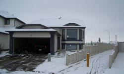Large 3 bedroom house to share with one other clean non-smoking person in NW Calgary.Available Feb.01 2012.Rent includes utilitys,cable,unlimited internet,seperate bathroom, partially furnished bedroom, laundry facilitys,half of two car garage, large deck