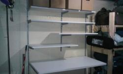 Antonius Shelving Unit - Originally purchased at IKEA.
 
Shelving Unit in Good Condition.
 
Can be used for Basement Area, Craft Area, Laundry Folding Table, Sewing Area....etc...
 
Table surface on bottom can be adjusted to different heights.
 
All