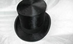 Vintage black silk top hat from Dunn & Co. London UK. Excellent condition size approx. 7.5, tag reads 450 / 718,  250-328-9980